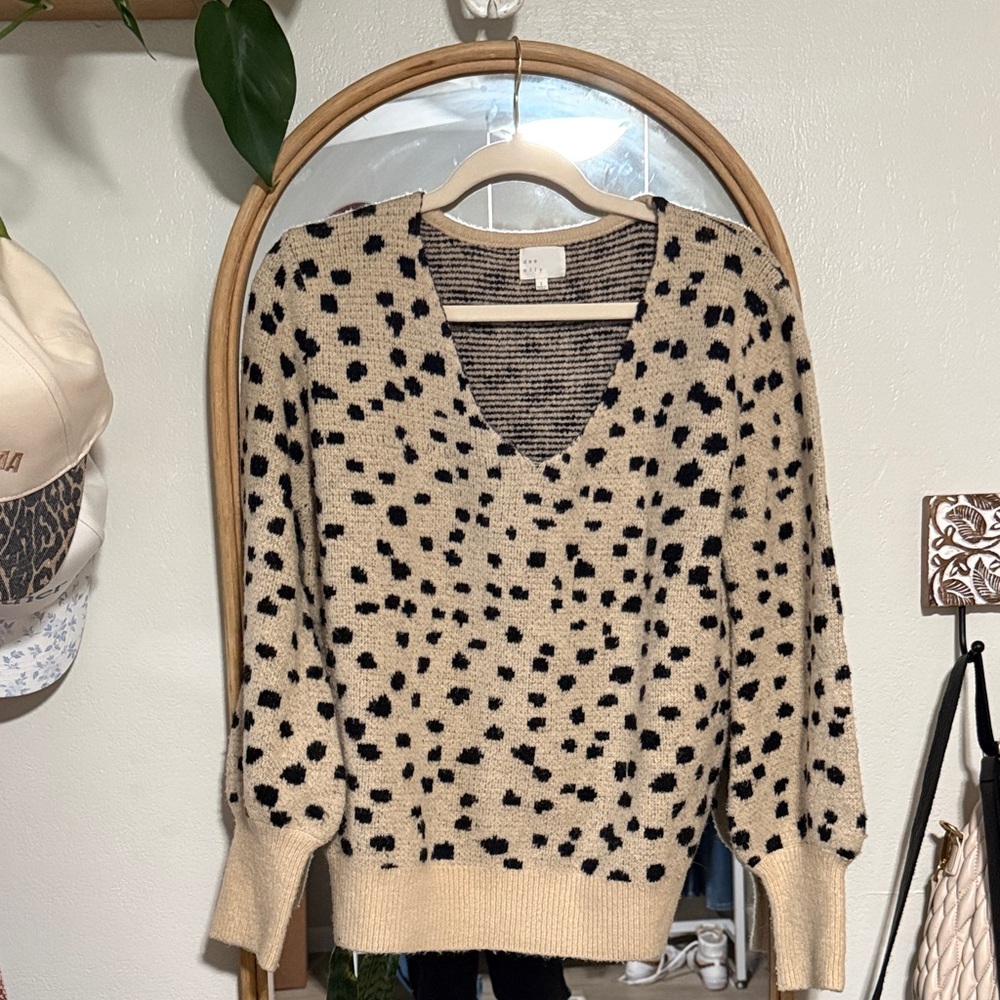 Elegant Black and Cream V-Neck Sweater
